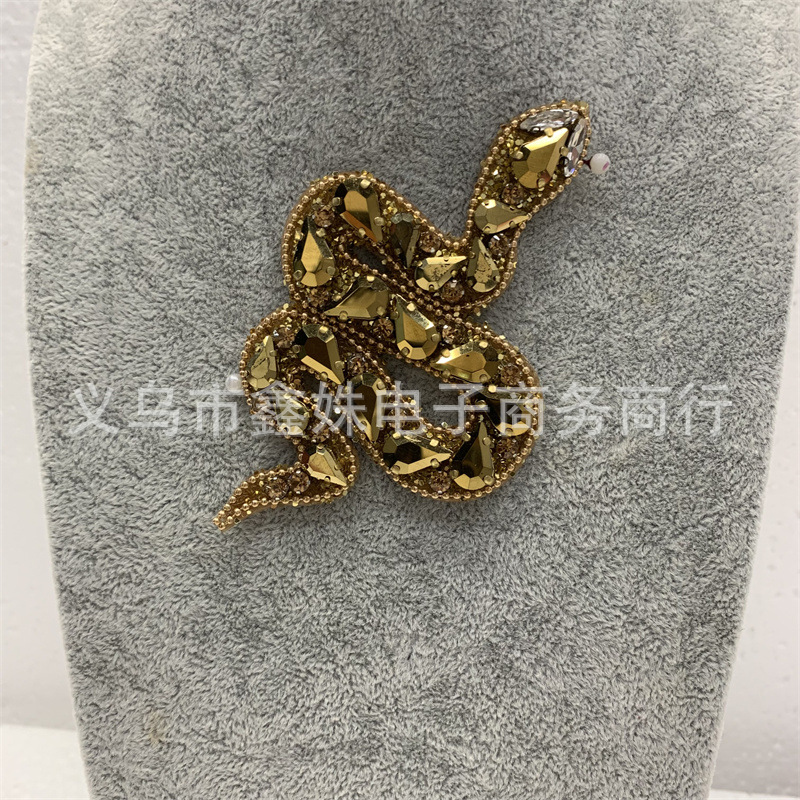 热销跨境新款时尚重工手工钉珠蛇装饰配件服装配饰