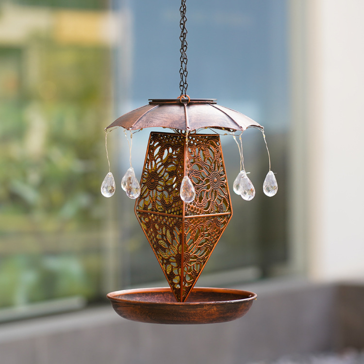 2022 Cross-border new products: ironwork solar lamps, hollowed-out brick and stone umbrellas, bird feeders, courtyard decoration, dynamic garden lamps details Picture