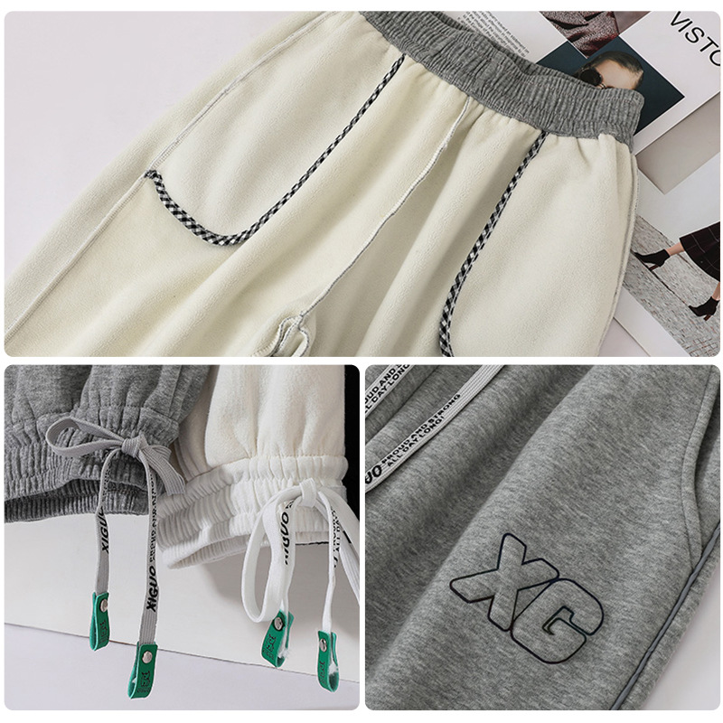Wholesale of women's autumn and winter fleece and thickened sportswear pants, high-waisted and tight-fitting outdoor waterproof and windproof sweatpants for both men and women details Picture