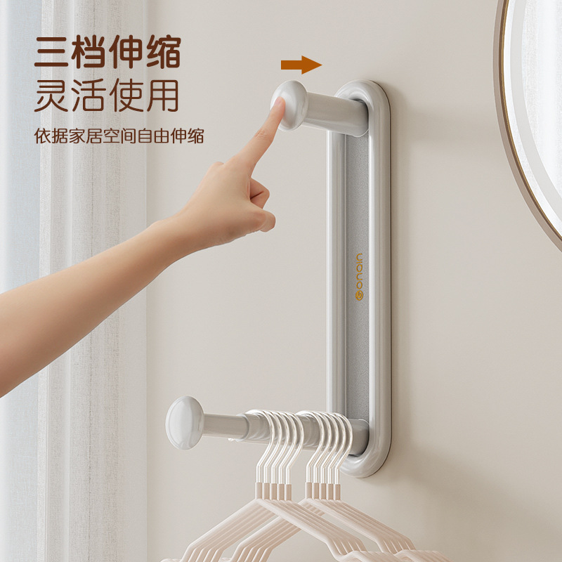 Simple traceless and perforation-free household hanger storage accessories wall-mounted retractable multi-functional hanger storage rack Application Scenario