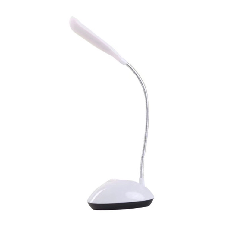 LED desk lamp enhancing a student study setup