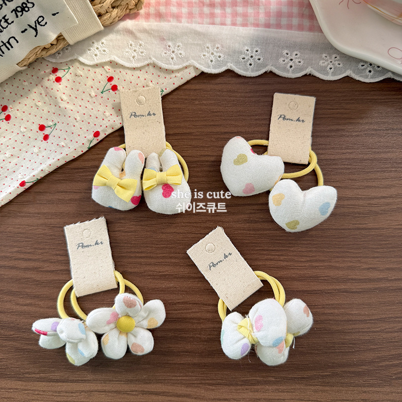 A new Korean-style sweet and innocent children's hair tie with a heart-shaped print, a girl's ponytail hair tie and a hair band, has been released details Picture