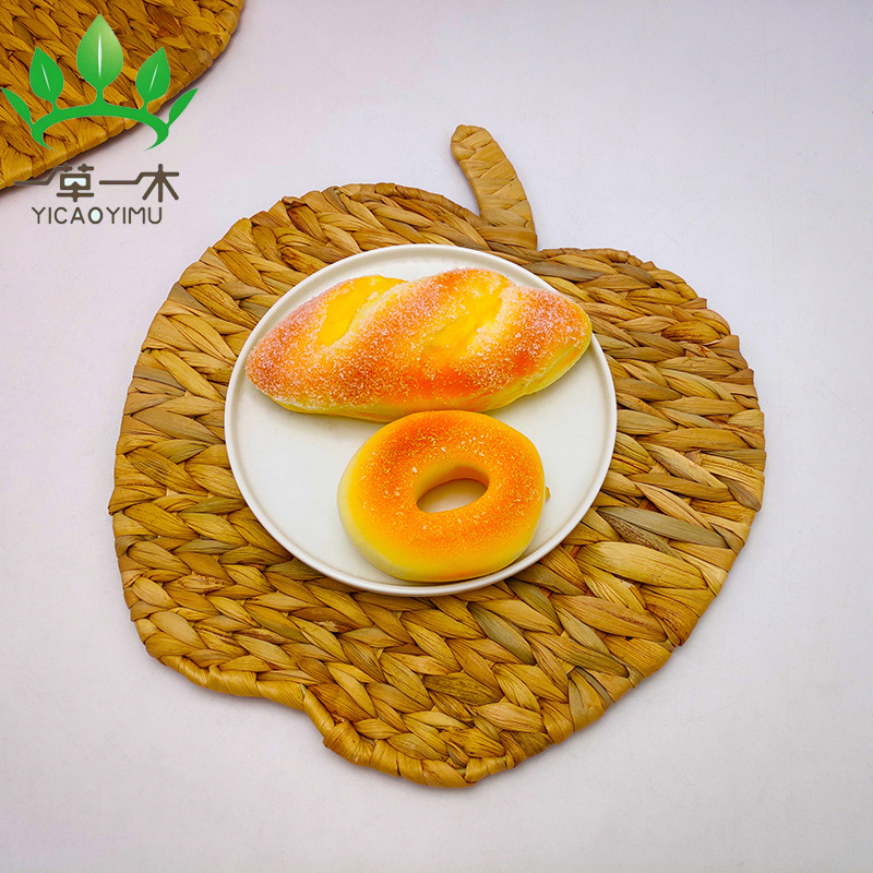 厂家定制葫芦草餐垫隔热垫草编餐垫手工编织水葫芦砂锅垫水草垫子