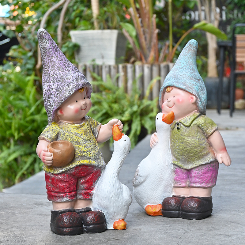 花园庭院别墅喂鹅娃娃造景装饰幼儿园户外卡通人物小孩雕塑摆件