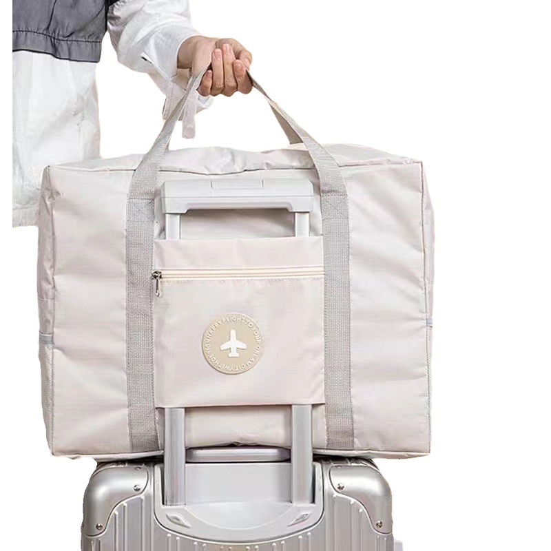 A large-capacity, waterproof, simple, lightweight, foldable short-distance luggage bag with a handle Item Picture