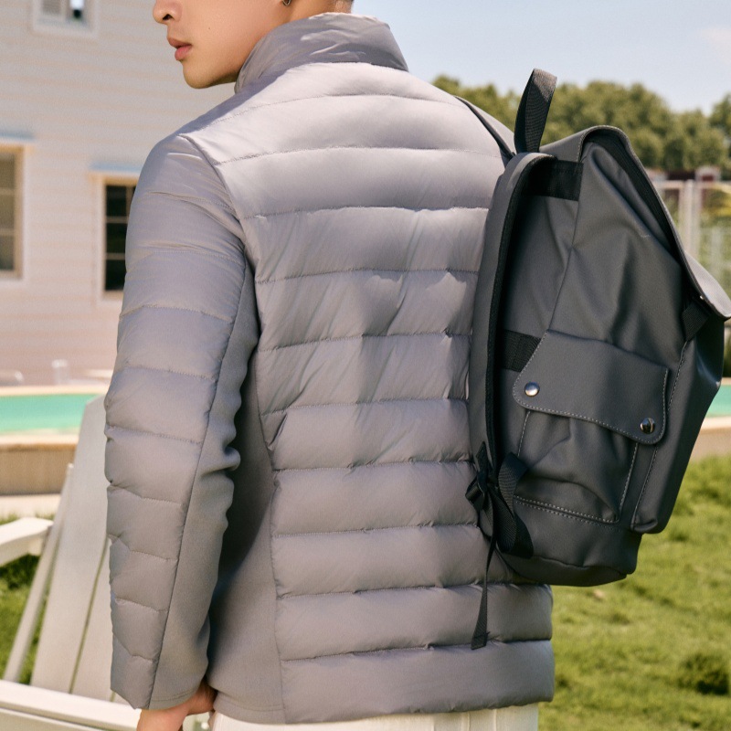 New winter down jacket for men: Lightweight, thickened with down, stand-up collar business coat. Men can wear a down jacket with an inner lining details Picture