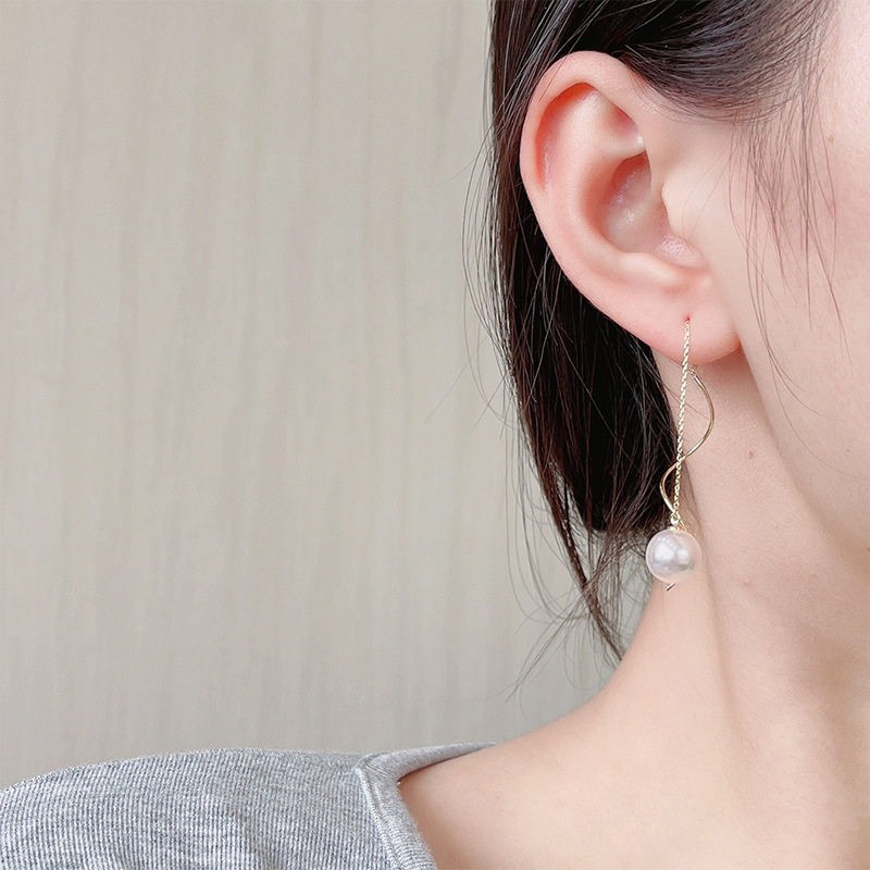 Obi's new pearl opal fringe ear line women's high-grade earring wholesale design sense of niche fashion temperament Application Scenario