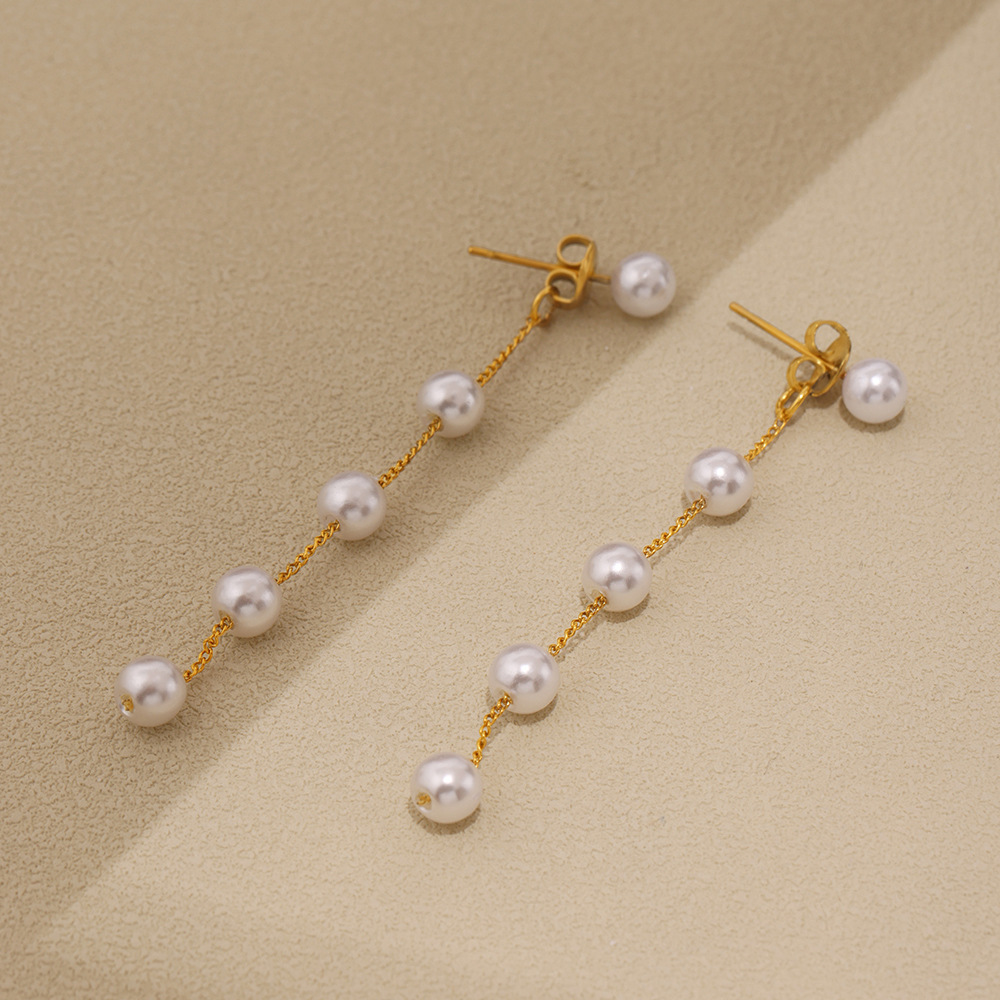 Mili's new lustrous beaded earrings, round face slimming and elegant, long tassel ear thread stainless steel earrings, popular on the Internet Application Scenario