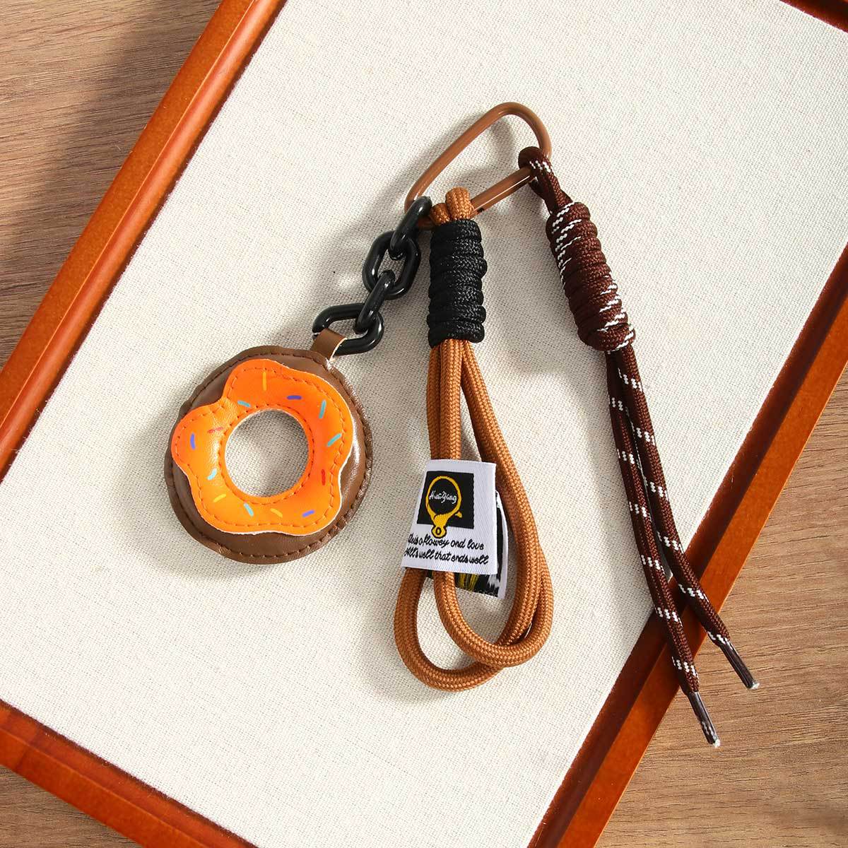 New doughnut leather Maillard color cross-border best-selling bag pendant, keychain, mobile phone lanyard pendant Application Scenario
