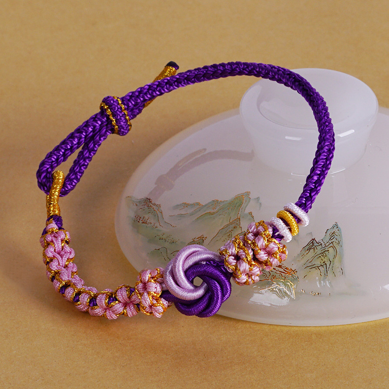 The peach blossom knot mandala bracelet is a hand-woven bracelet for women. It can be strung with gold beads. DIY finished product: woven rope and beaded Specification image
