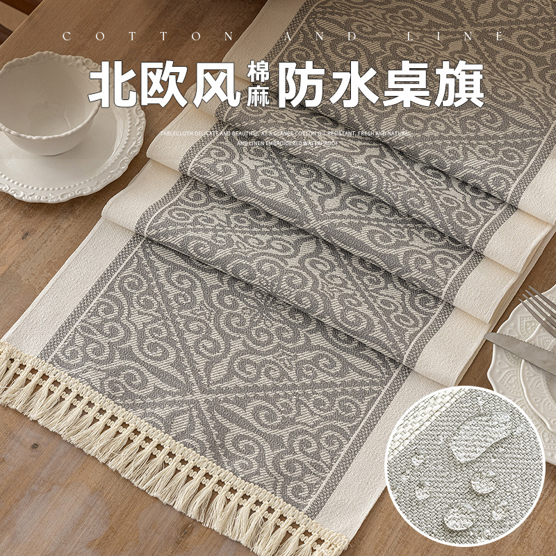 Kuyuki nuevo nórdico moderno simple generoso diseño de alta calidad sensación algodón lino tela de bandera de té lujo ligero impermeable jacquard paño de tira de borlas mesa lateral mesa de té mesa de bandera de pelo
