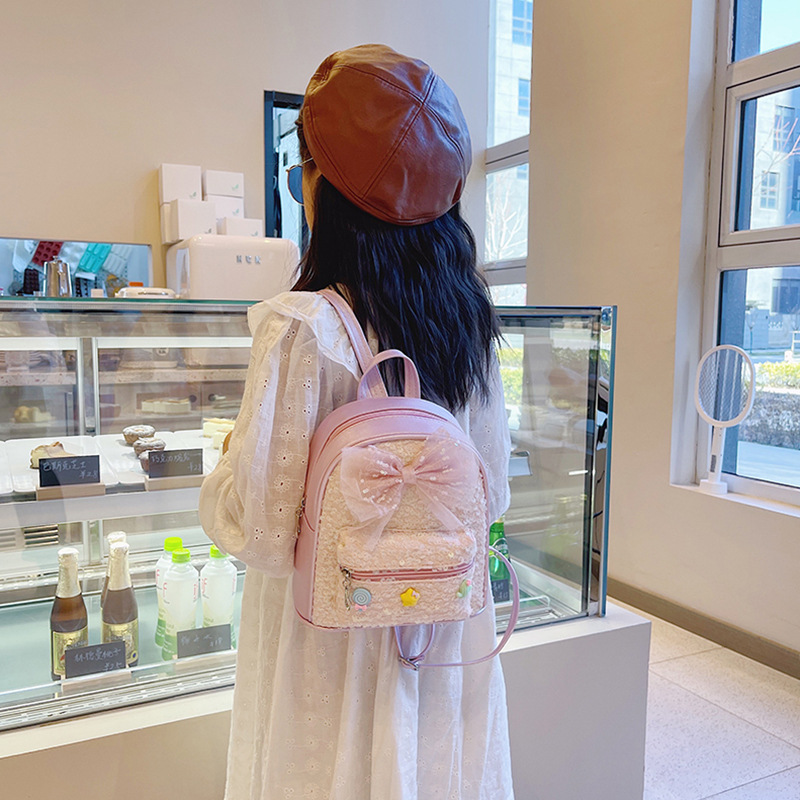 Source Manufacturers New Children's Bag Girls Fashion Trend Sequin Small Backpack Big Bow Baby Backpack details Picture