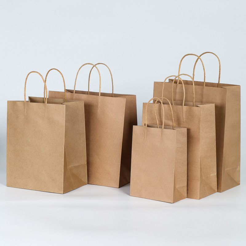 Custom-made and wholesale milk tea and coffee kraft paper bags, Christmas gift hand-held paper bags for clothing stores details Picture