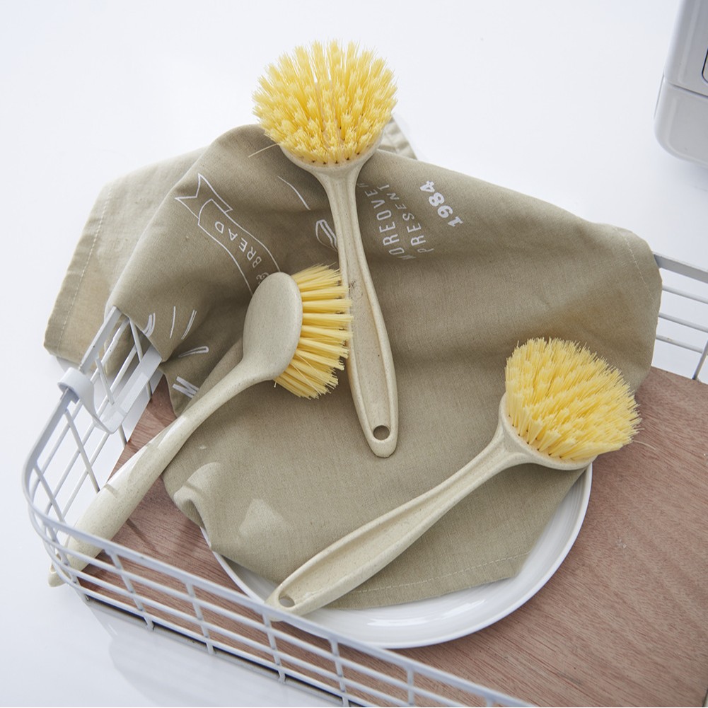 The plain wheat straw multi-functional brush for washing POTS is a bestseller in Yiwu. It is a plastic cleaning brush from Huangyan