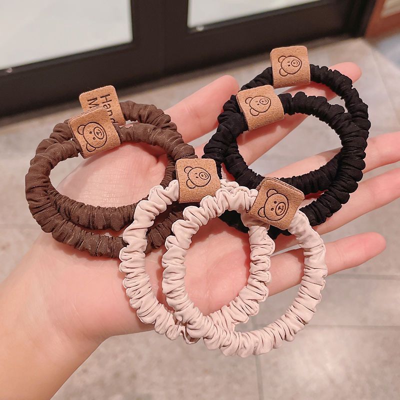 Spring Label Milk Tea Color Leather Band Smiley Face High Stretch Bear Label Hair Band Tie Hair Large Band Head Rope Wholesale 100 details Picture
