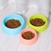 The new multi-functional, simple and solid-color dog food bowl with an arc-shaped slow food column design is a pet slow food bowl that can prevent choking and sputtering details Picture