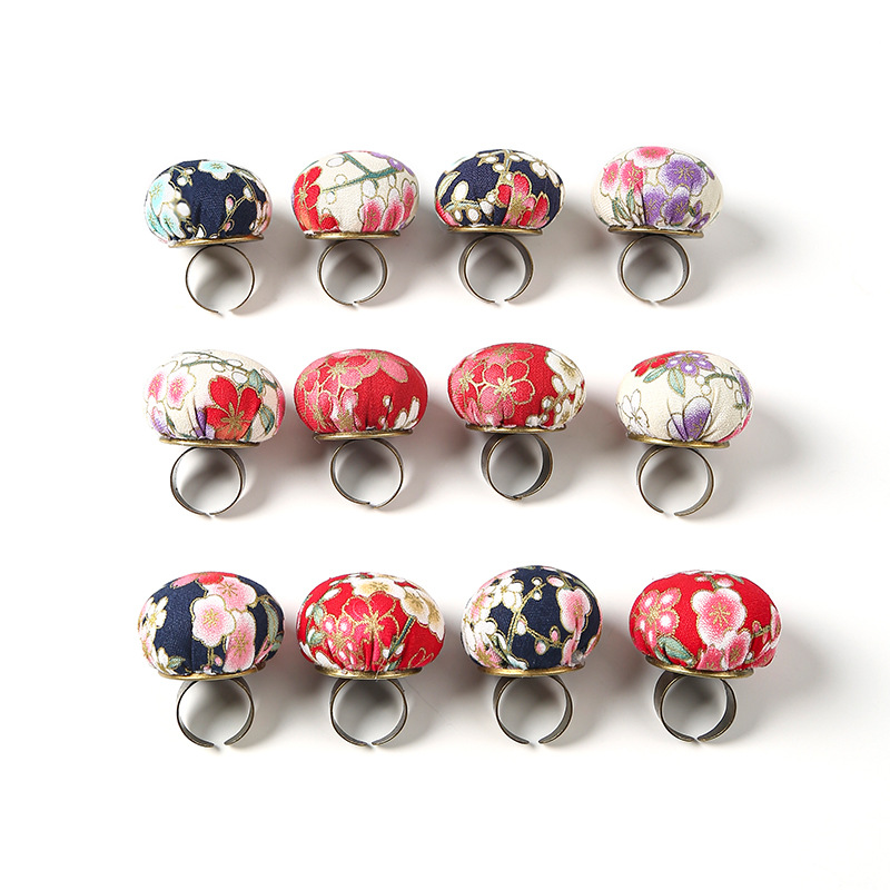Manufacturers wholesale embroidery ring buckle needle insert DIY cross stitch tools needle insert ball hand sewing cloth needle insert bag Item Picture