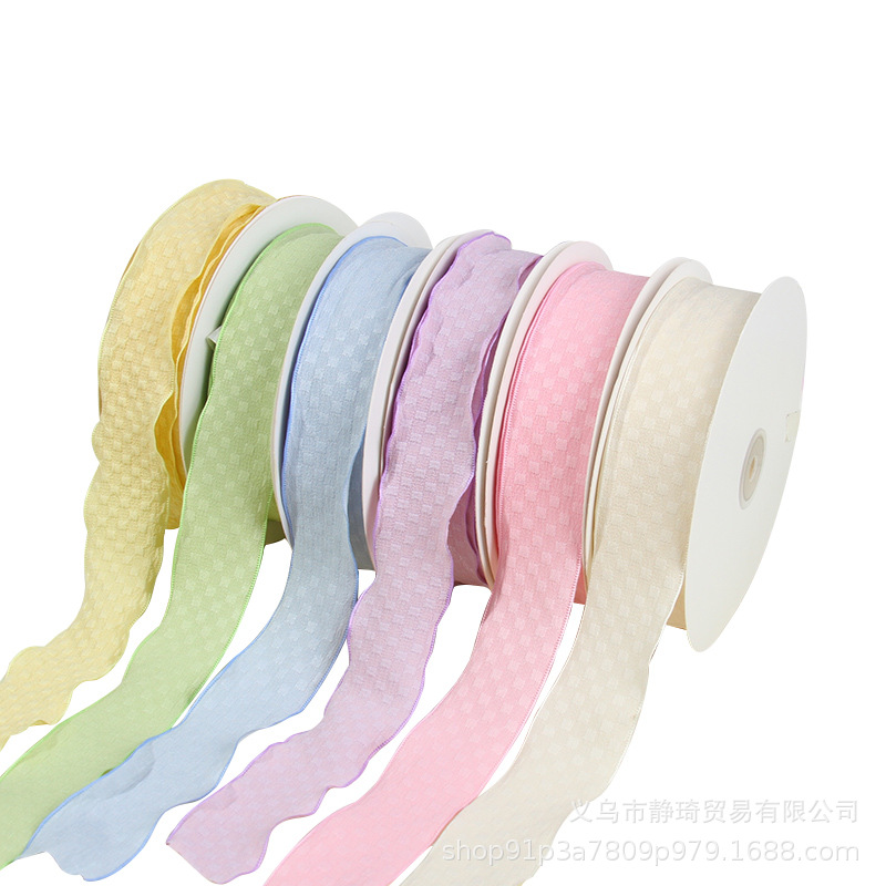 ماكارون الصغير من الثلج المنقوش الذي يغزل الغزل والنسيج مع قوس القماش Item Picture