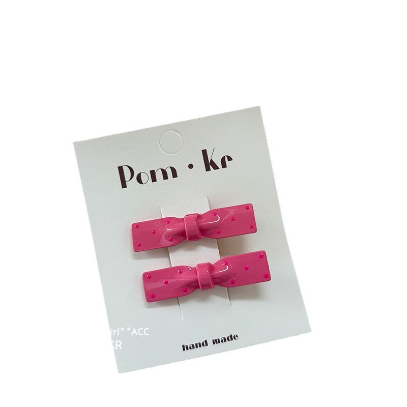 The new polka dot girlish bow duckbill clip is cute, simple and versatile. It's a sweet and trendy bangs side clip Item Picture