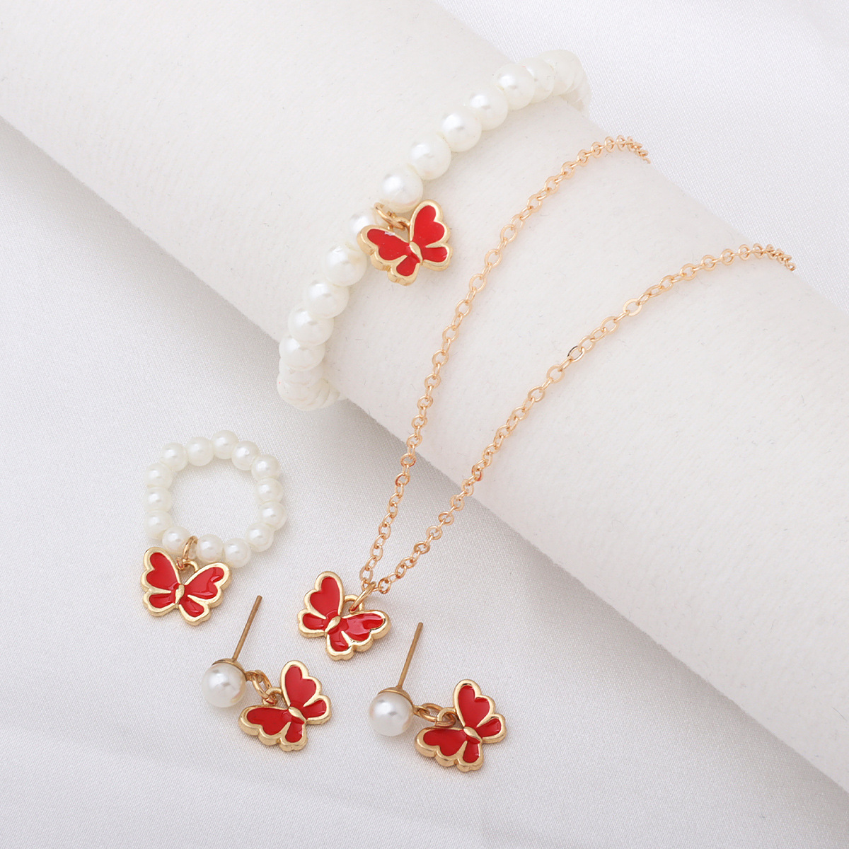 Cross-border fashion pearl butterfly jewelry sets, oil-dripping butterfly pearl bracelets, earrings, necklaces, women's accessories wholesale Cross-border fashion pearl butterfly jewelry sets, oil-dripping butterfly pearl bracelets, earrings, necklaces, women's accessories wholesale