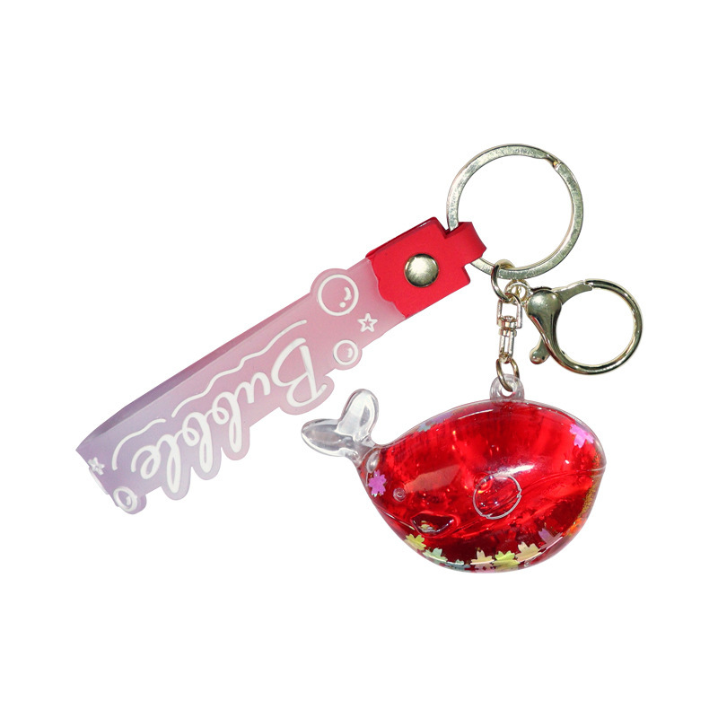 Sand bottle with oil, dolphin and whale keychain, luminous snowflake, sparkling message bottle, exquisite children's schoolbag, small pendant Item Picture