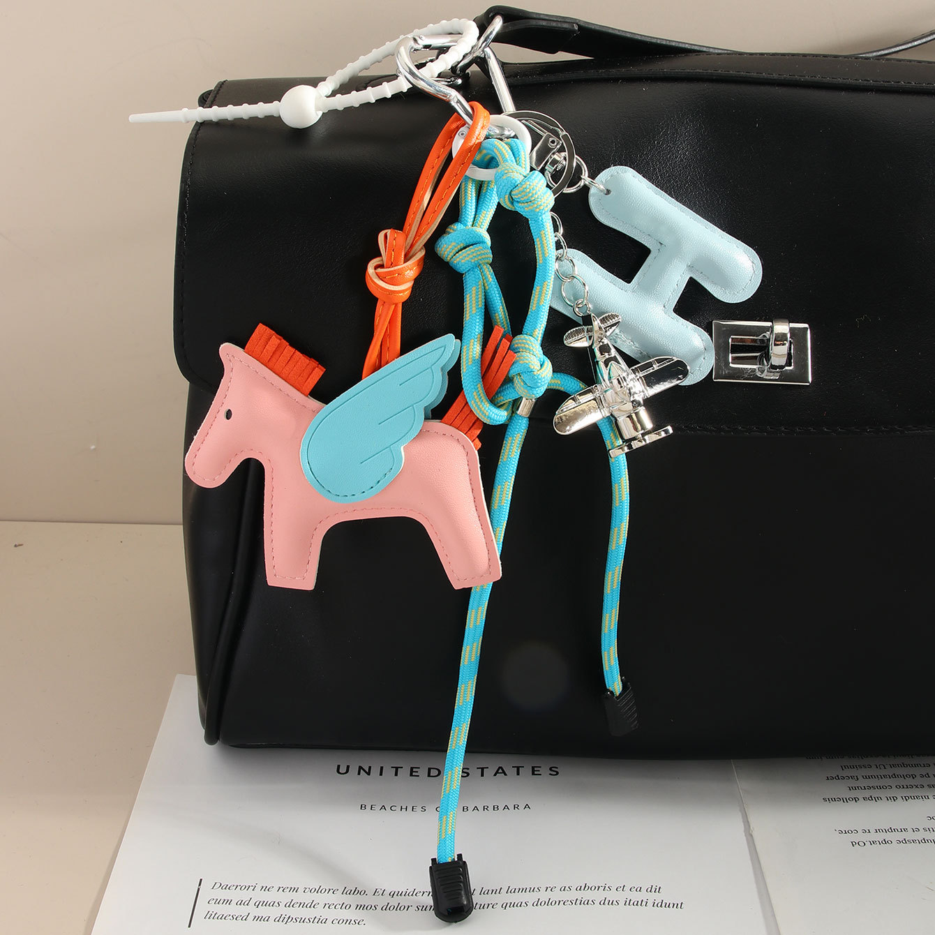 miu series H Pegasus bag Pendant, airplane letter keychain, lanyard, leather bag pendant, leather hanging accessory details Picture