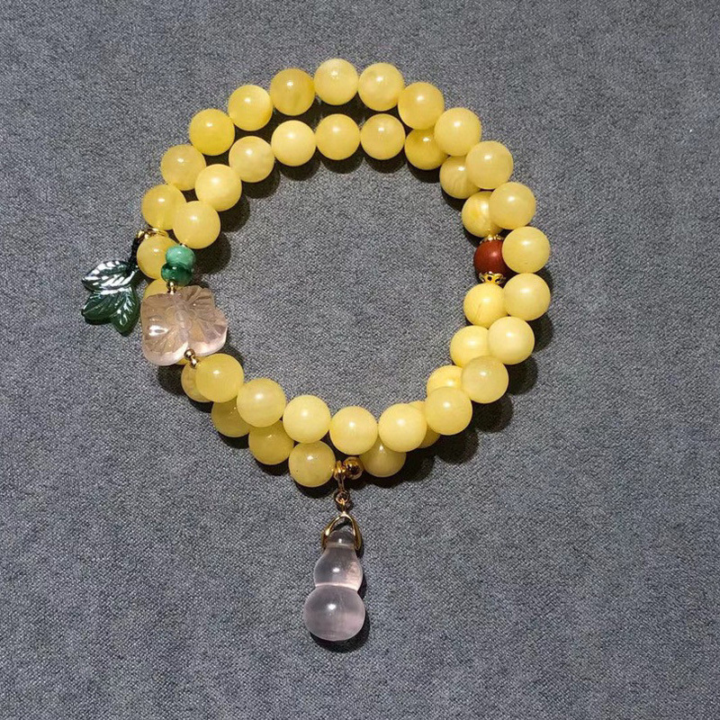 Natural 8MM double-layer beeswax bracelet with multiple circles of rose crystal butterfly gourds, retro bracelet, a perfect accessory for ladies to give to their best friends Application Scenario