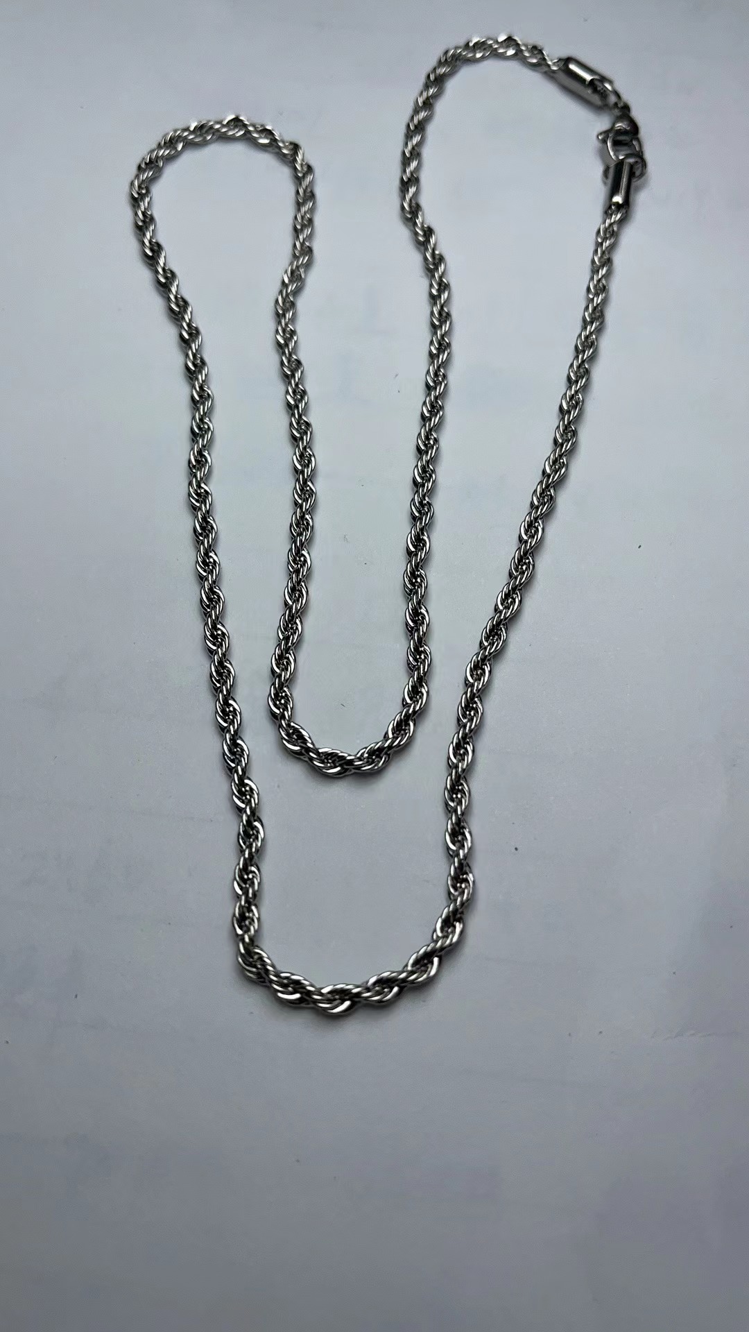 Direct sales of creative and simple stainless steel necklaces, European and American stainless steel twist necklaces, men's export accessories chains details Picture