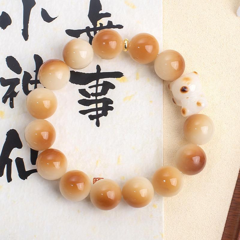 Natural Bodhi root bracelet, charcoal-grilled heart-shaped bear, men and women playing with fingers, soft Buddha beads, prayer beads, Bodhi seed bracelet wholesale details Picture