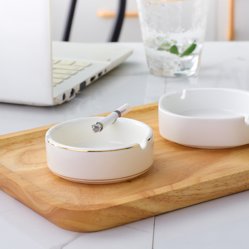 Pure white ashtrays for hotels and guesthouses, gold-edge ceramic cigarette cups. Ashtrays for restaurants, hotels and eateries support logos details Picture