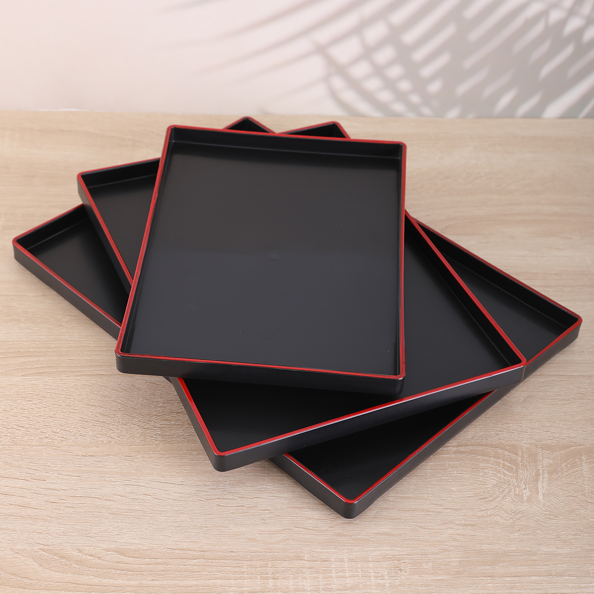 Wholesale of new Japanese-style red-edge wood-like pallets, square anti-slip plastic pallets, and food delivery pallets for coffee shops and Japanese restaurants