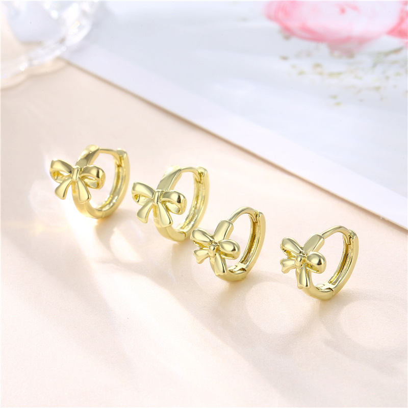Cross-Border 18K Gold Bow Earrings Korean Version Fashion Ear Buckle Small Ear Buckle Female Network Red Design Sense Earrings Popular Accessories Fashion Earrings Korean Version details Picture