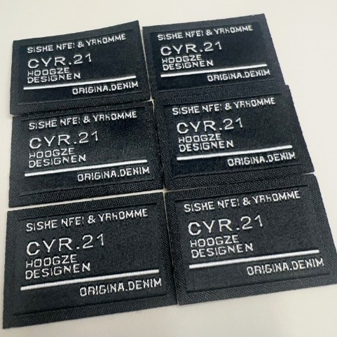 刺绣徽章/水洗标/服装辅料/滴塑定制/商标贴产品图