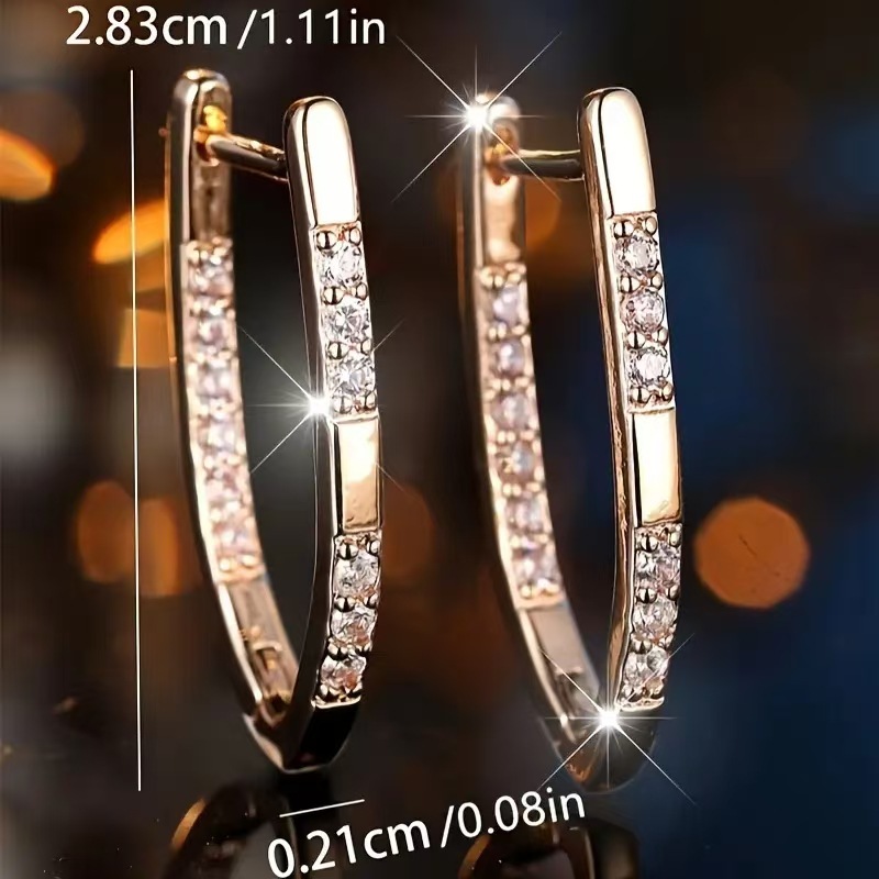 The new fashionable micro-inlaid zircon V-shaped high-end earrings are unique geometric earrings for women, with a distinctive and niche style that exudes a trendy vibe Application Scenario