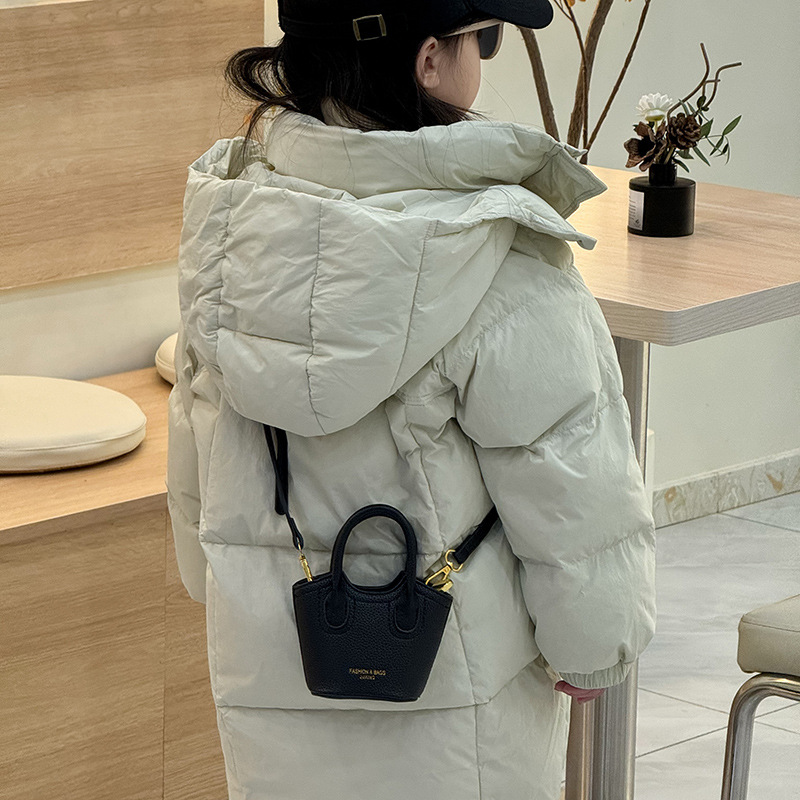 Children's vegetable basket Bag 2025 New Korean style simple solid color crossbody bag for kids, stylish mini girls' handbag Specification image