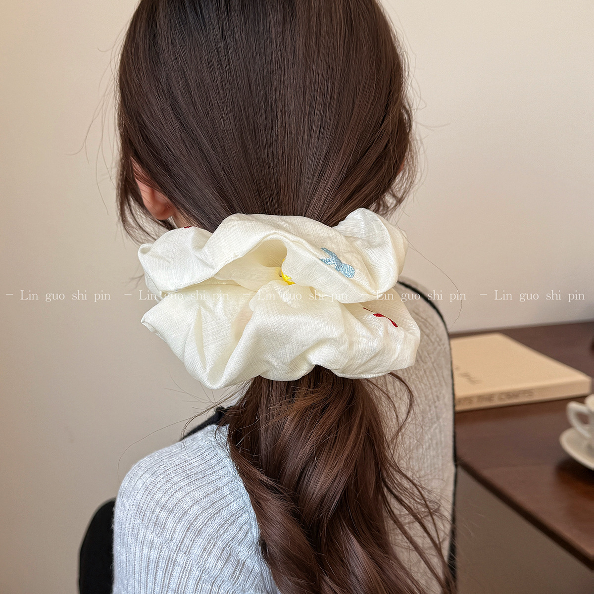 A new handcrafted embroidered colorful bow tie with a large hair band and a ponytail hair tie, exuding a light luxury and high-end charm for women with a hair tie details Picture
