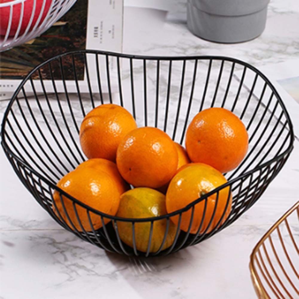 Creative lotus leaf ironwork fruit baskets, living room home desktop storage baskets, Nordic fruit draining baskets of different heights wholesale Application Scenario