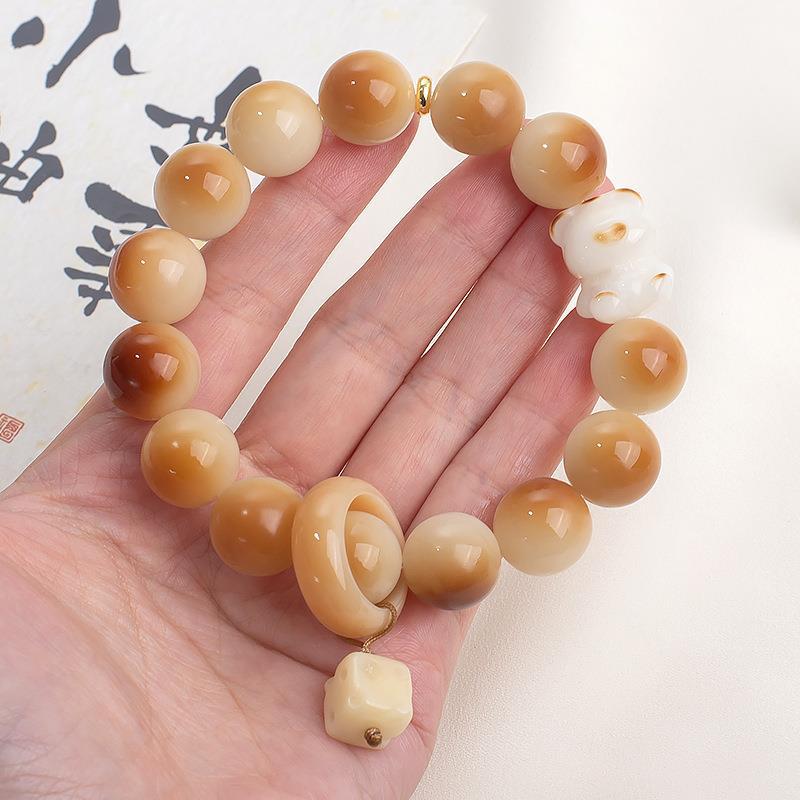 Natural Bodhi root bracelet, charcoal-grilled heart-shaped bear, men and women playing with fingers, soft Buddha beads, prayer beads, Bodhi seed bracelet wholesale