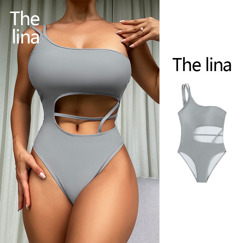 The 2023 new solid-color single-shoulder high-waisted bikini swimsuit with a hollowed-out Brazilian and European style one-piece swimsuit is sexy
