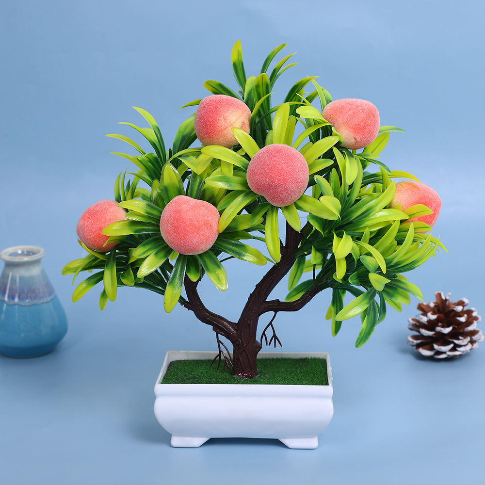 A comprehensive collection of simulated fruit potted plants and bonsai, including red apples, pomegranates, strawberries, oranges, peaches, mangoes, bananas, and red peppers for decoration