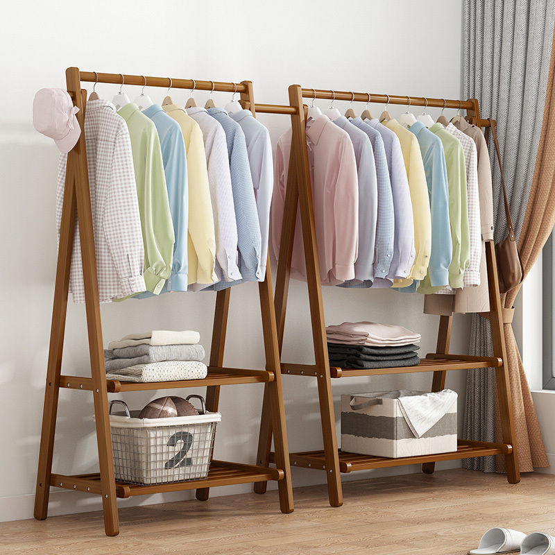 A floor-standing household simple clothes drying rack for the bedroom, a popular storage solid wood indoor room storage rack