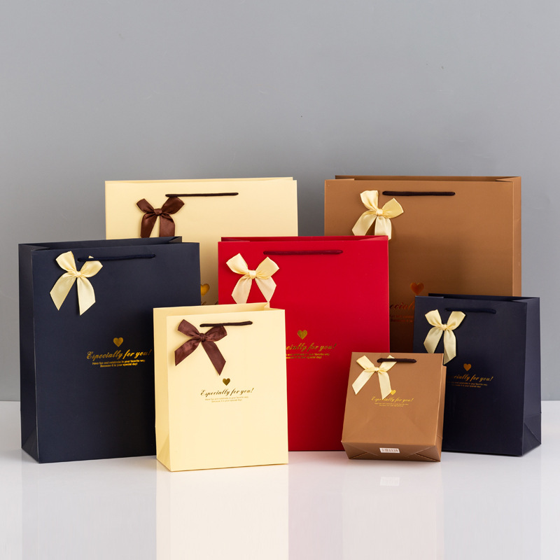 Bow paper bags, wedding and festival gift bags, clothing shopping handbags, candy jewelry packaging bags, printed logos
