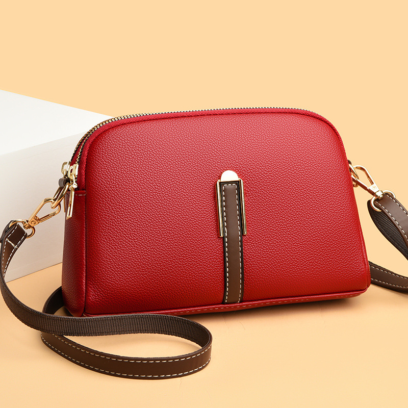 Bolsa de mujer 2024 nuevo estilo shell bag versión coreana simple bolso de un hombro bolsa de teléfono móvil textura crossbody bolsa pequeña cross-border wholesale