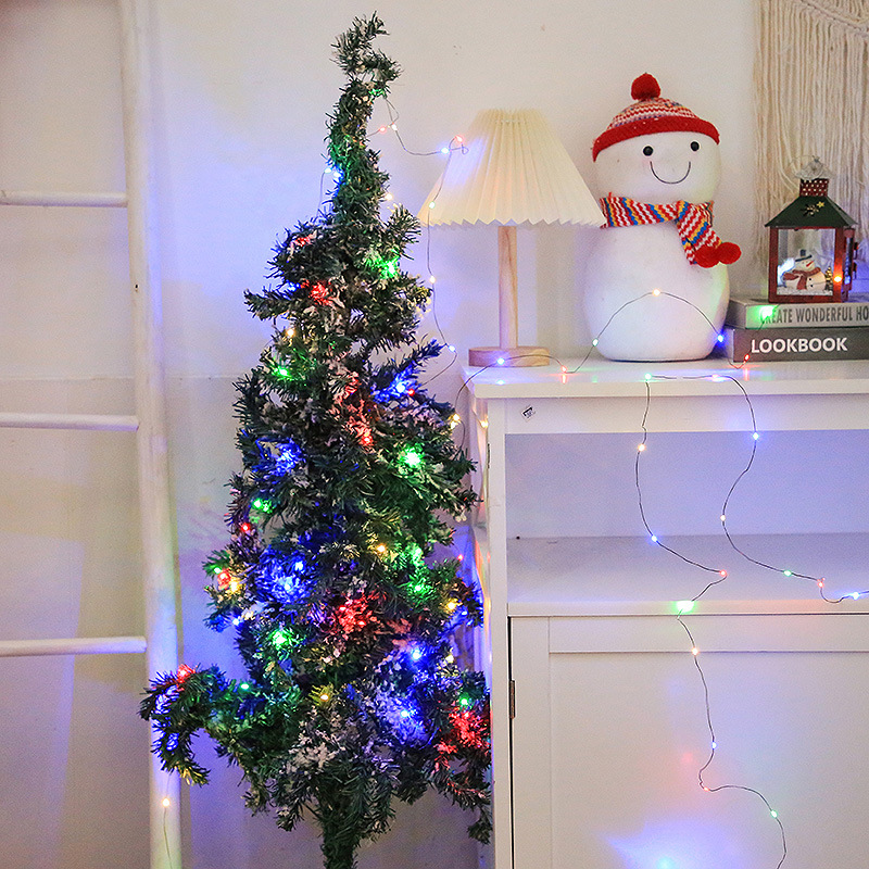 Remote-controlled Christmas tree green wire led copper wire light string, starry sky green plant vine hanging on the tree, outdoor festival decorative light Application Scenario