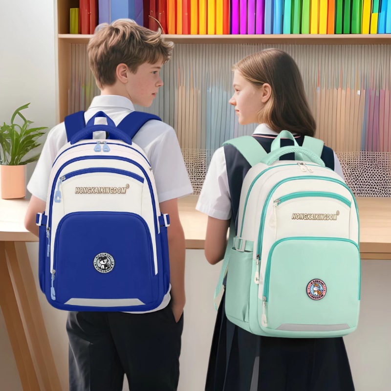 2025新款男女背包大容量多功能时尚双肩包初中小学生护脊防水书包