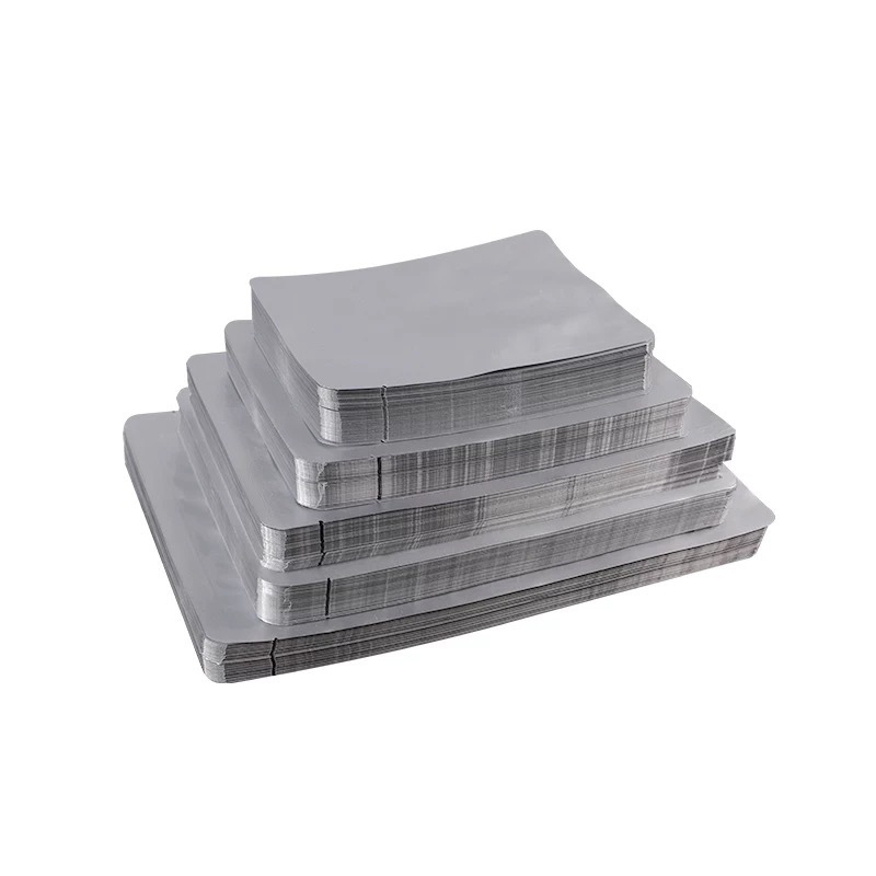 Wholesale manufacturer supplies three-side sealed aluminum-coated vacuum packaging bags, flat-mouth facial mask bags, food and tea sealed bags, blind bags Item Picture