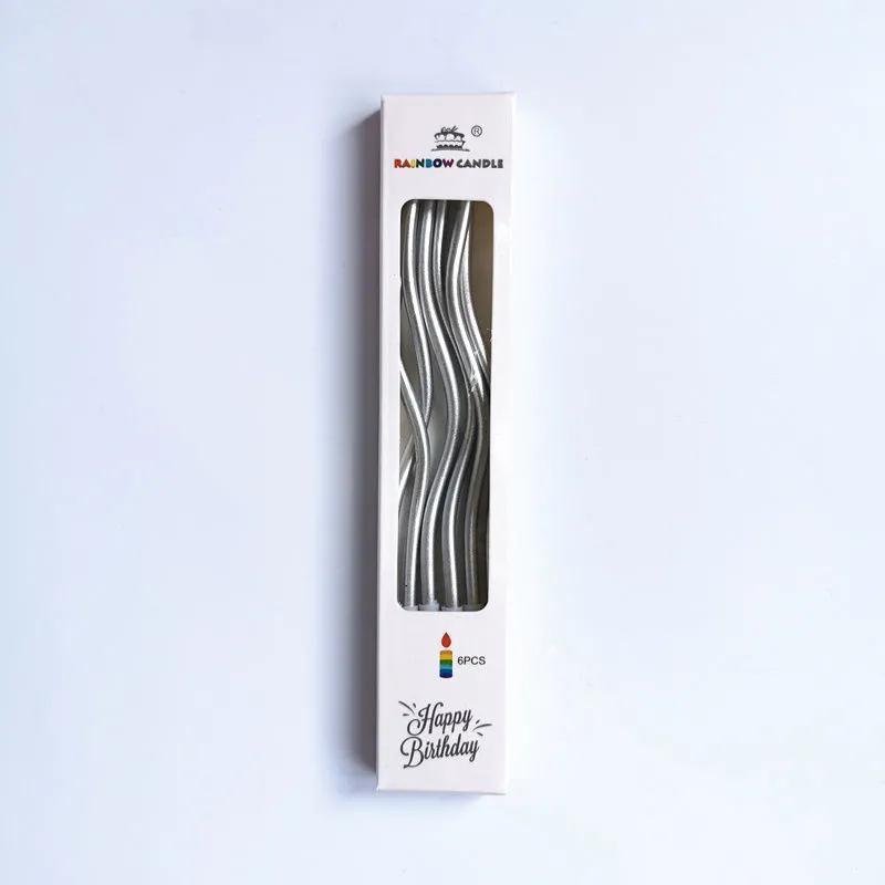 A birthday cake decorated with colorful gold and silver curved candles, smokeless, odorless, gold-plated and cute spiral wave candles details Picture