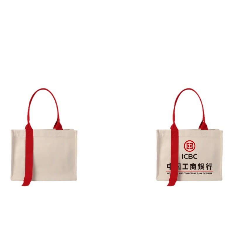 帆布托特包飘带帆布袋定制印logo手提帆布包定做立体购物袋单肩白底实物图