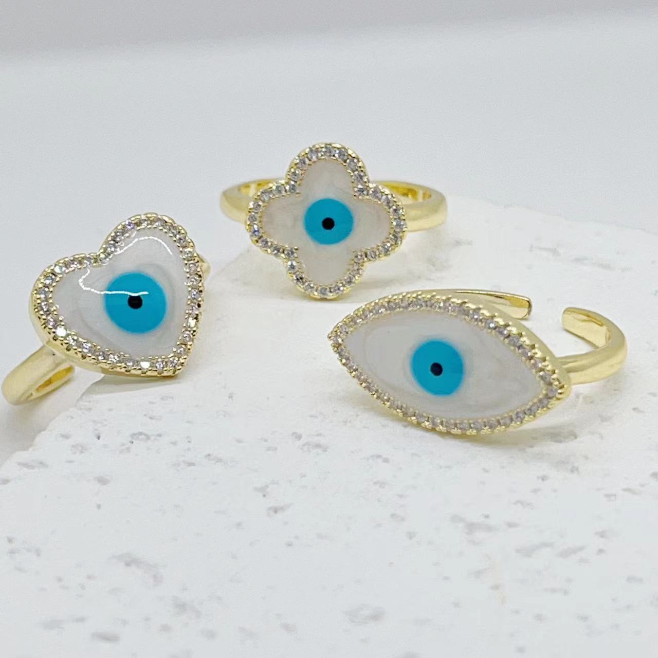 European and American cross-border fashion design sense, devil's eye, copper plated with real gold, heart-shaped eyes, four-leaf clover opening ring for women