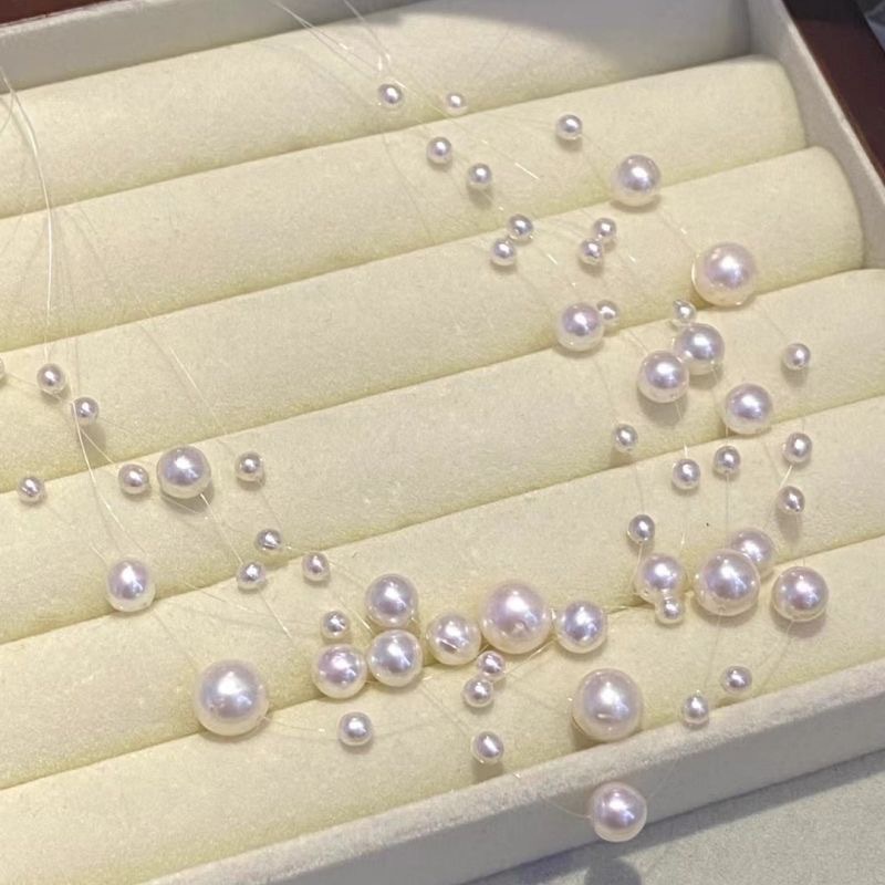 Simple and aesthetic Korean fan pearl multi-layer necklace personality transparent fishing line collarbone chain network red ins wind choker wholesale